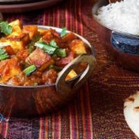 Kadai Paneer · Paneer seasoned with our special house ground masala with onions, bell peppers and tomatoes....