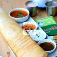 Masala Dosa · Rice and lentil crepe filled with potato curry served with chutneys and sambar