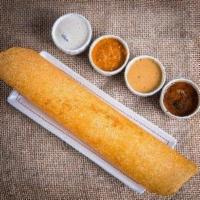 Mysore Masala Dosa · Rice and lentil crepe first blasted with spicy sauce and then filled with potato curry. Serv...