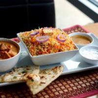Chicken Tikka Masala Combo · Lunch Portion of Chicken Tikka Masala served with an appetizer, basmati rice, half naan and ...