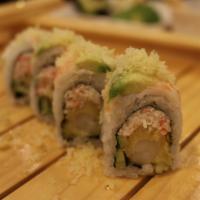 King Tiger Roll · Inside: shrimp tempura, crabmeat, cucumber. Top: boiled shrimp, avocado, crunch flakes, eel ...