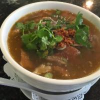 Bamee Ped (Duck noodles soup) · Duck noodle soup. BBQ roast duck, with green onions, bean sprouts, cilantro, and fried garlic.