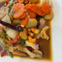 Cashew Nut · Sauteed garlic sauce, snow peas, carrots and onions, dried chili and cashew nut.