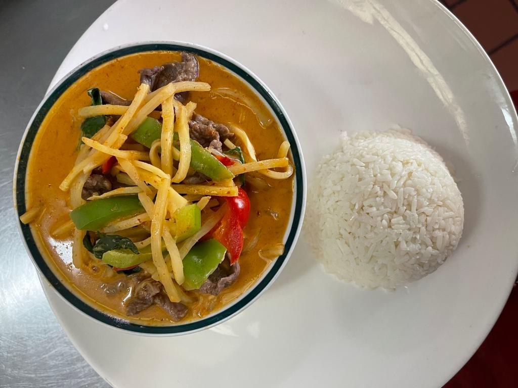Red Curry · Eggplant or bamboo shoots, bell peppers, Thai basil and coconut milk.