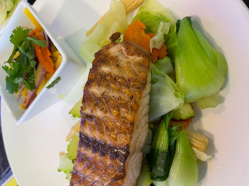 CC5. Grilled Salmon · Grilled Fillet Salmons top on steam mix vegetables ands served with spicy lime sauce
