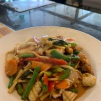 CC7.Curry Paste Seafood · Mix seafood sauteed with bamboo, green beans, bell pepper, basil and Thai herbs stir with sp...