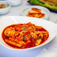 A3. Spicy Rice Cake (떡볶이) · Sweet batter that has been baked.