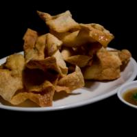 6 Crab Cream Cheese Wontons · Crispy wonton wrapper stuffed with crab, cream cheese, green onions and carrots. Served with...