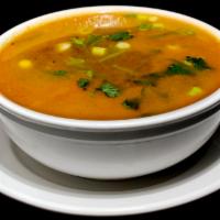 Tom Yum Soup · Spicy soup made with your choice of chicken or vegetables, straw mushrooms, lemongrass, lime...