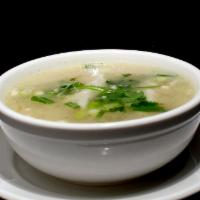 Wonton Soup · Pork dumplings, ground chicken, cilantro and bean sprouts in a tasty chicken broth.