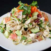 Thai Chicken Salad · Sliced chicken tossed with fresh cucumbers, tomatoes, bean sprouts, red onions, green onions...