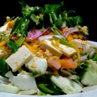 Garden Salad · Lettuce, cucumber, bean sprouts, tofu, onions, carrots, tomatoes and crushed peanuts topped ...