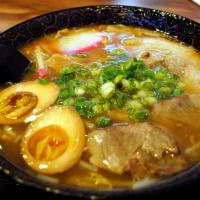 Miso Ramen · Tonkotsu broth infused with miso flavored noodle soup, topped with marinated egg,corn, red p...