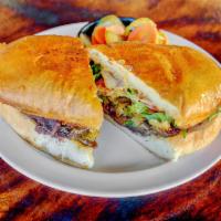 Torta Rostizada · Portabellas y nopales and salsa tomatillo, served on telera rolls with romaine, sliced sweet...