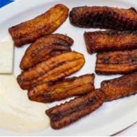 Platano Frito · Servido con crema y queso. Fried plantains. Served with sour cream and cheese.