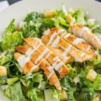 Caesar Salad w/ Chicken · Romaine lettuce, croutons, and Parmesan cheese. Served with Caesar dressing.