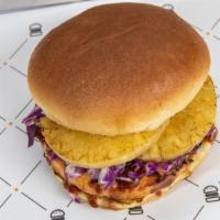Hawaiian Salmon Burger · 1/4 lb. patty, red cabbage slaw, pineapple, ginger vinaigrette and BBQ glaze. *Additional (u...