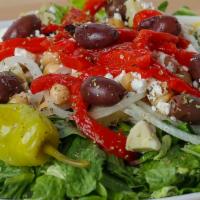 Greek Salad · Artichokes and Feta Cheese with Onions, Garbanzo Beans, Roasted Red Pepper, Kalamata Olives,...