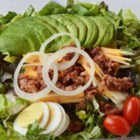 Gluten Free Cobb Salad · Avocado, American and Swiss Cheese, Onions, Bacon Bits, Grape Tomatoes and Hard Boiled Egg