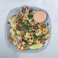 Cabo Calamari · crispy calamari, fried lemon slices, Fresno chilies, chipotle aioli