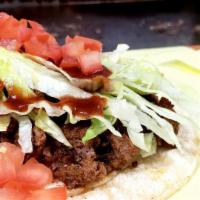 Beef Tacos · Ground Beef with Cheese, Lettuce, Tomato with Corn tortillas