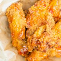 Chili Jam Wings · Traditional Thai style sweet and spicy sauce.
