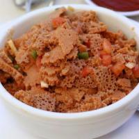 38. Timatim Fitfit · Finely chopped tomatoes jalapeno and onion flavored with lemon-based house seasoning mixed w...