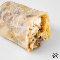 Fish Burrito · Grilled tilapia, lime rice, refried black beans, lettuce, pico de gallo, cilantro, flour tor...