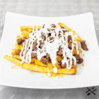 Asada Fries · Steak, pinto beans, mexican blend cheese, sour cream, queso fresco, potato fries