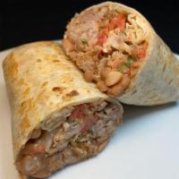 Regular Burrito · Meat of your choice in a flour tortilla with  beans and salsa fresca.