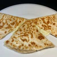 Regular Flour Quesadilla · Grilled flour  tortilla with melted cheese. Ask for guacamole, salsa & sour cream on the sid...