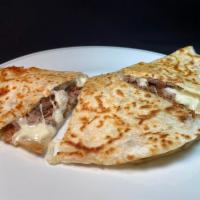 Super Flour Quesadilla · Grilled flour tortilla with meat of your choice & melted cheese.  Ask for guacamole, salsa &...