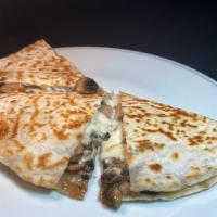Mushroom Flour Quesadilla · Grilled flour tortilla  with melted cheese & sauteed mushrooms. Ask for guacamole, salsa & s...