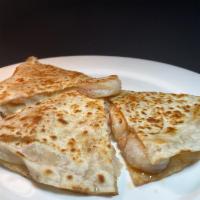 Super Prawn Flour Quesadilla · Grilled flour tortilla with sauteed prawns and melted cheese. Ask for guacamole, salsa & sou...