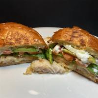 Torta with Fish · Grilled filet of fish in a hot french roll with melted cheese, mayonnaise, sour cream, chees...
