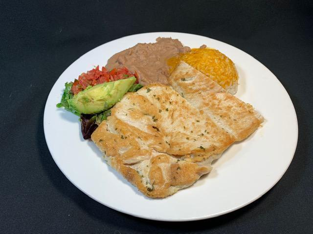 Meat Plate · Meat of your choice served with refried pinto beans andMexican rice, a small salad, salsa fresca & a slice of avocado. Your choice of corn or flour tortillas.