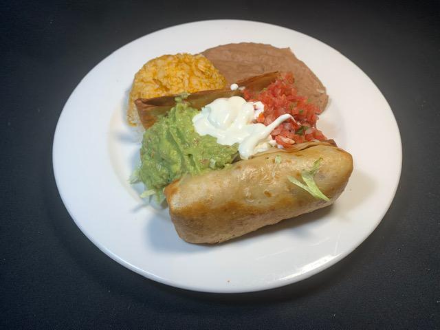 Chimichanga Plate · Deep fried burrito with meat of your choice , melted cheese, served with guacamole, sour cream, lettuce and Mexican cheese. Refried beans & Mexican rice.