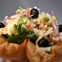 Grilled Chicken Taco Salad · Grilled  Chicken on a Tortilla shell, whole pinto beans at the bottom romaine lettuce, onion...