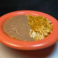 12 oz. Bowl of Rice and Beans · 6 oz of your choice of rice: Mexican or plain steam, and 6 oz of choice of beans: refried or...