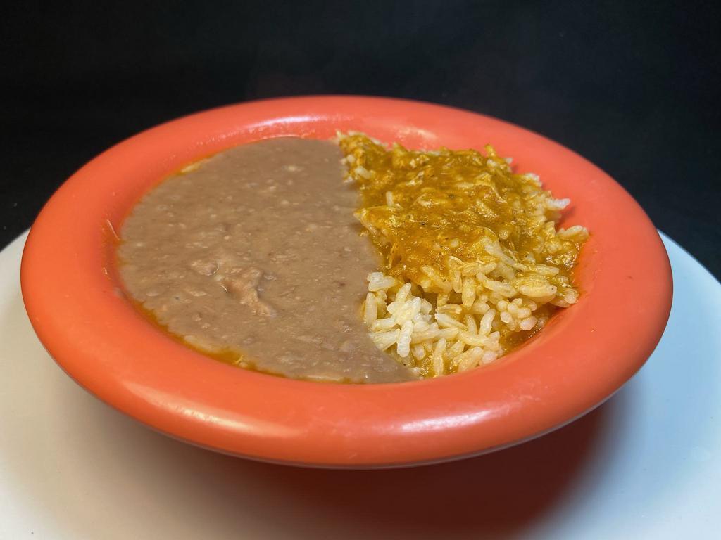 12 oz. Bowl of Rice and Beans · 6 oz of your choice of rice: Mexican or plain steam, and 6 oz of choice of beans: refried or whole pinto. A total of 12 oz.