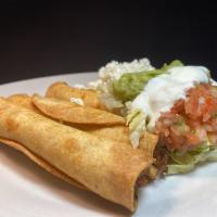 Flautas (Taquitos) · 3 flautas (chicken, pork, potatoes) lettuce, salsa fresca, guacamole, Mexican cheese, sour c...