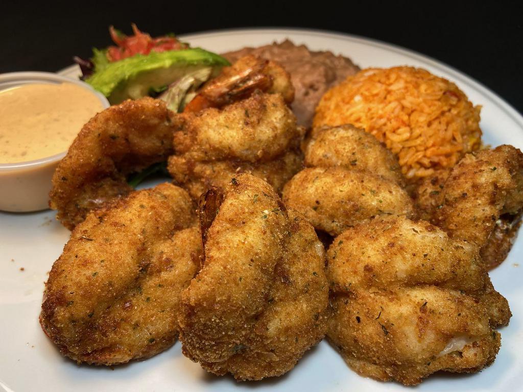 Camarones Empanizados · Nine breaded large  prawns served with refried beans, Mexican rice, salad & avocado slice. Your choice of  4 corn or 3 flour tortillas.   Served with four corn or three flour tortillas