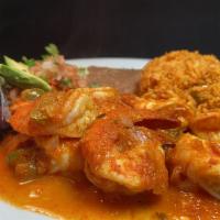 Camarones Rancheros · Large sauteed Prawns, onions, tomatoes, serranos with homemade ranchera sauce. Served with r...