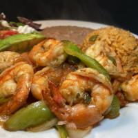 Prawn Fajitas · Grilled large prawns with sautéed onions, bell peppers and tomatoes.  served with refried  b...