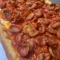 Lou Lou’s spicy pepperoni  · Mini peps fresh mozzarella cheese fresh tomato sauce square deep dish pizza