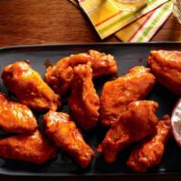 Buffalo wings catering  · Buffalo wings with blue cheese and hot sauce 