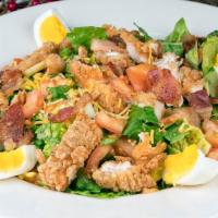Crispy Chicken Salad · 3 fried chicken strips, 2 bacon strips, diced tomatoes, cheddar cheese and one hard boiled e...