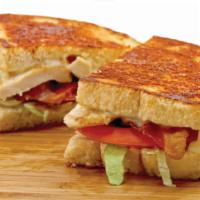 Chicken Bacon Griller Sandwich · Grilled chicken breast, bacon, tomatoes, lettuce, inside a delicious grilled sourdough. Incl...