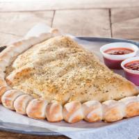 Create Your Own Calzone Large  · Mozzarella and ricotta cheese, and your choice of additional ingredients for an additional c...