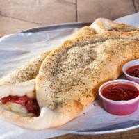 Create Your Own Stromboli · Mozzarella and provolone, and your choice of additional ingredients for an additional charge.